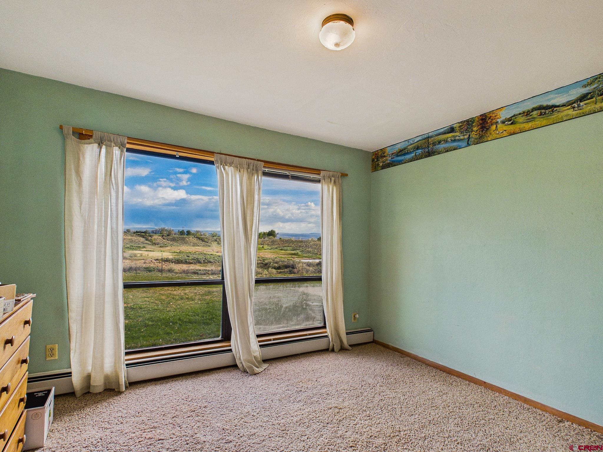 37760 Back River Road Paonia, CO 81428 - Photo 38 of 38 a view of an empty room with a window