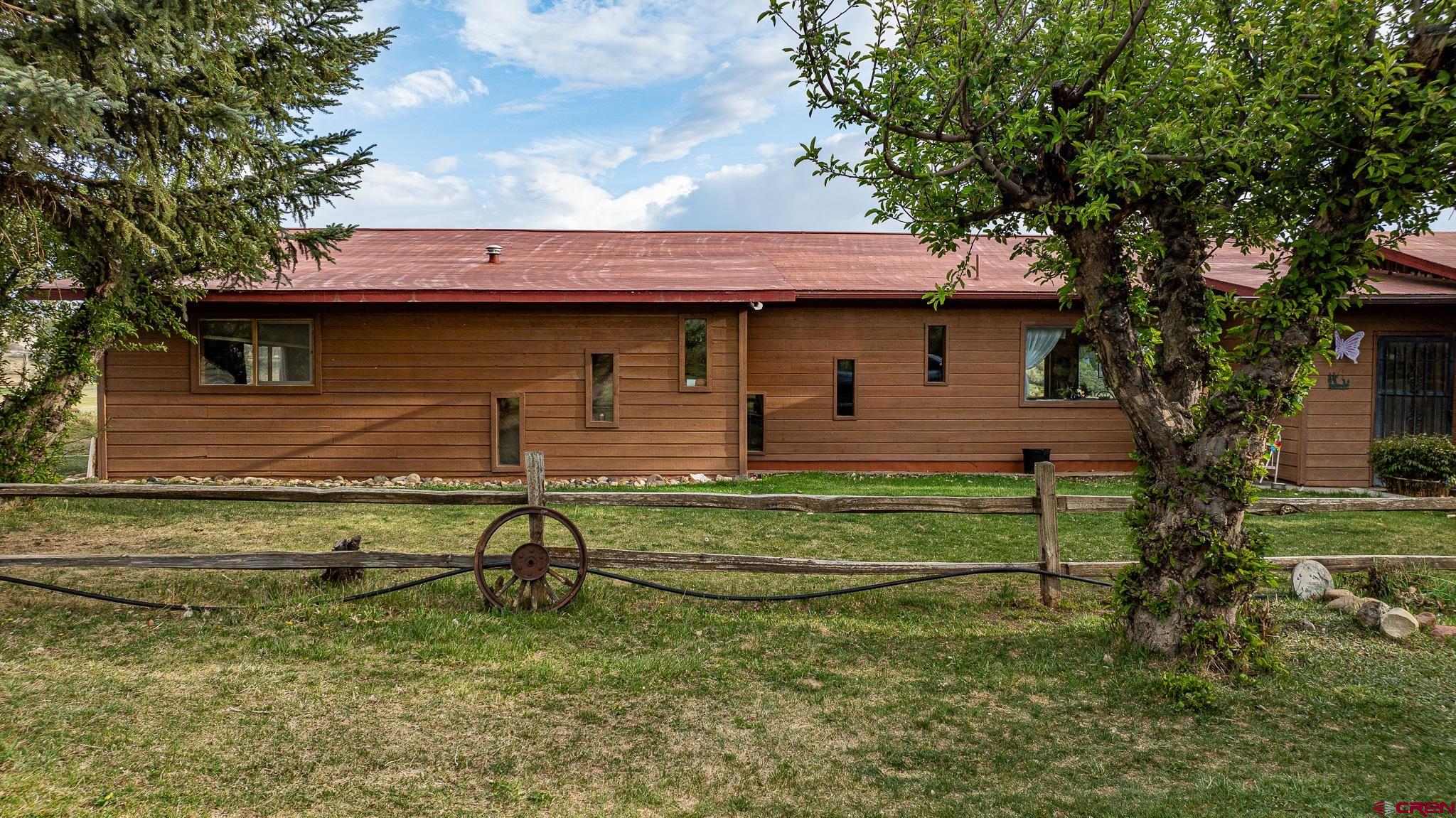 37760 Back River Road Paonia, CO 81428 - Photo 5 of 38 a front view of a house with garden