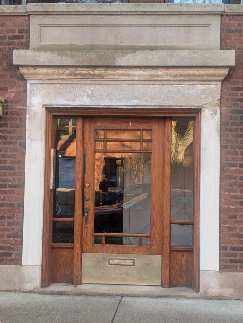 1419 East 56th Street, Unit 1 Chicago, IL 60637 - Photo 2 of 35 a view of the entryway of a house