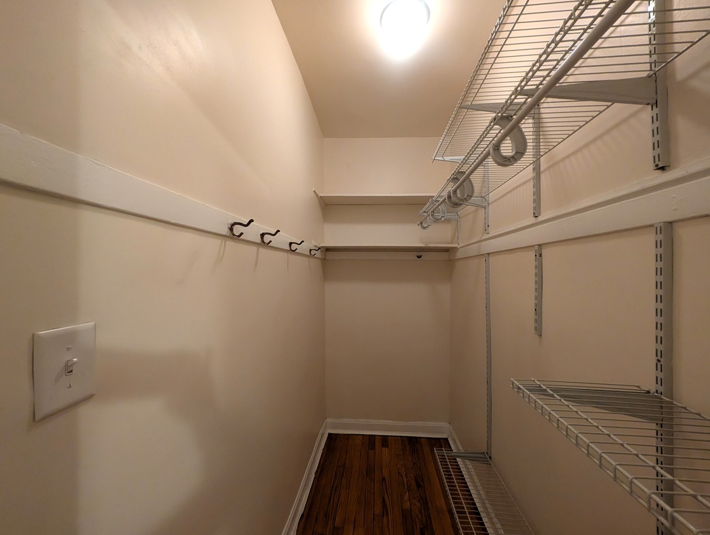 1419 East 56th Street, Unit 1 Chicago, IL 60637 - Photo 21 of 35 a view of a room with racks on the wall