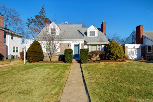 a house view with a garden space