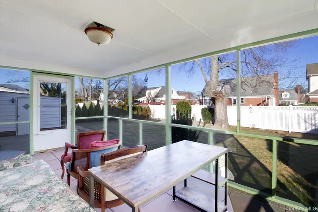 a view of a house with pool and a yard