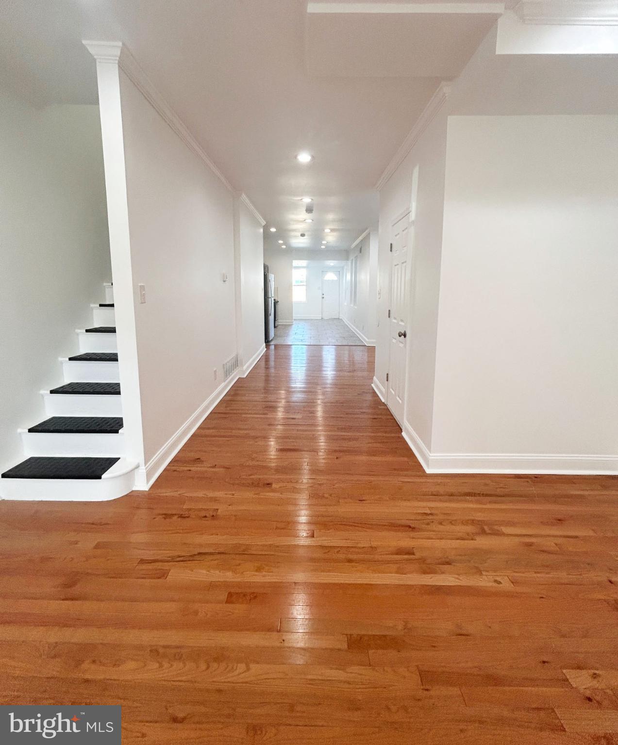 1241 Orthodox Street Philadelphia, PA 19124 - Photo 2 of 26 a view of a room with wooden floor