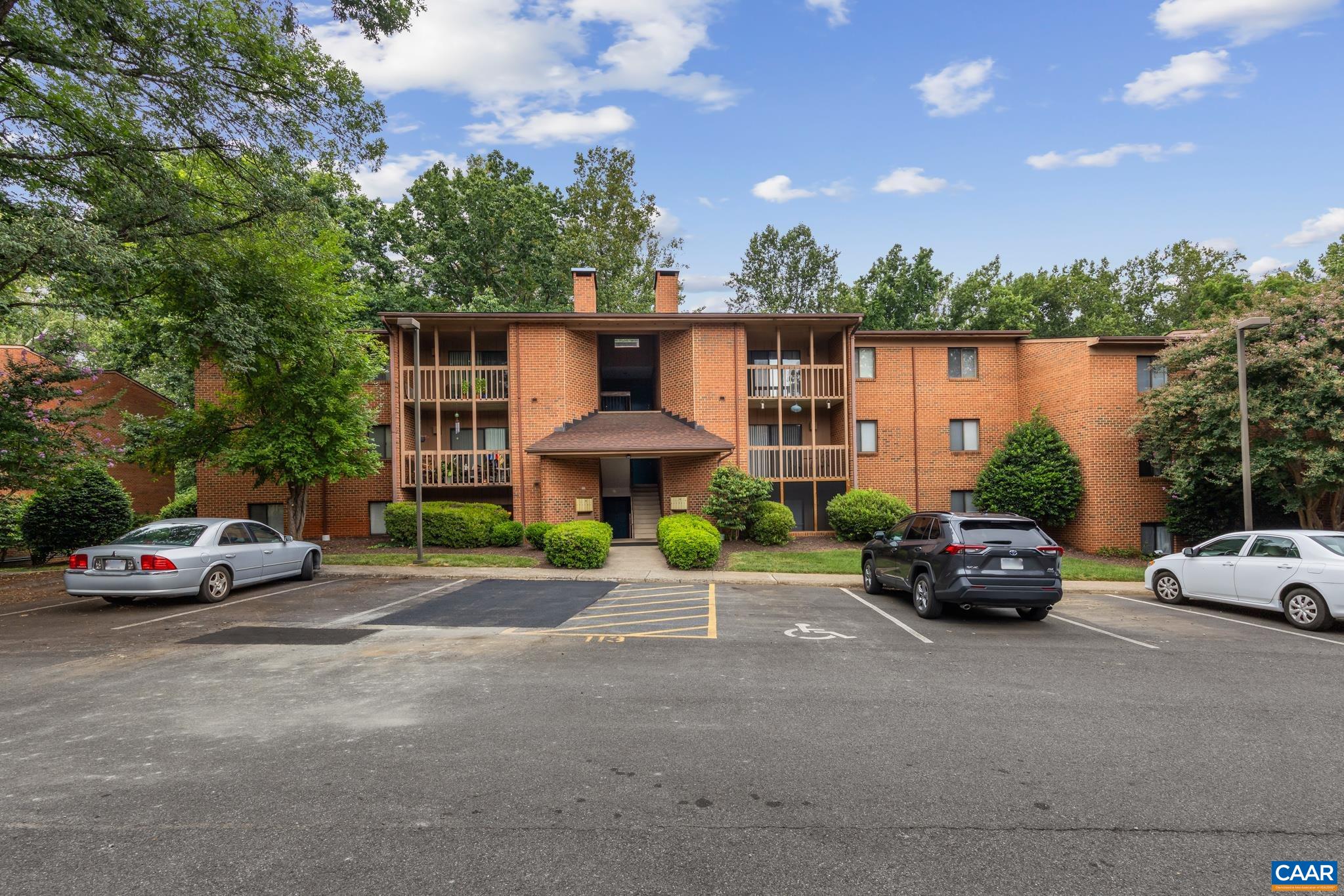 113 Turtle Creek Road, Unit 3 Charlottesville, VA 22901 - Photo 1 of 22 a view of a car parked in front of a house