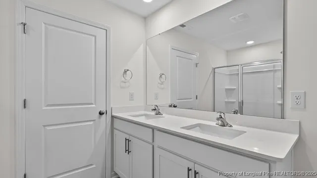 $379,940 | 1091 Shoreline Drive, Vass, NC 28394