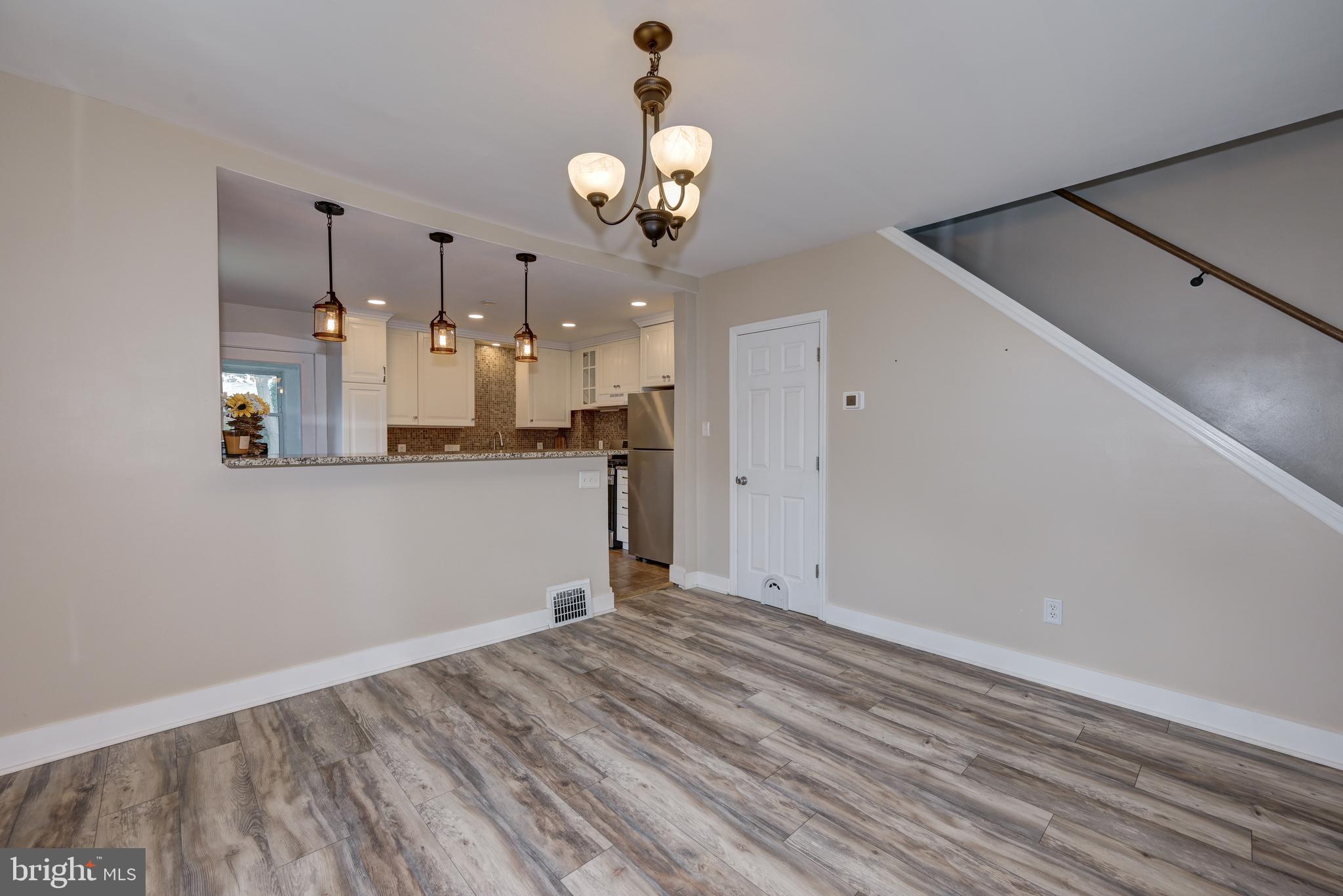 323 Cleveland Avenue Riverside, NJ 08075 - Photo 17 of 36 a view of a kitchen with wooden floor
