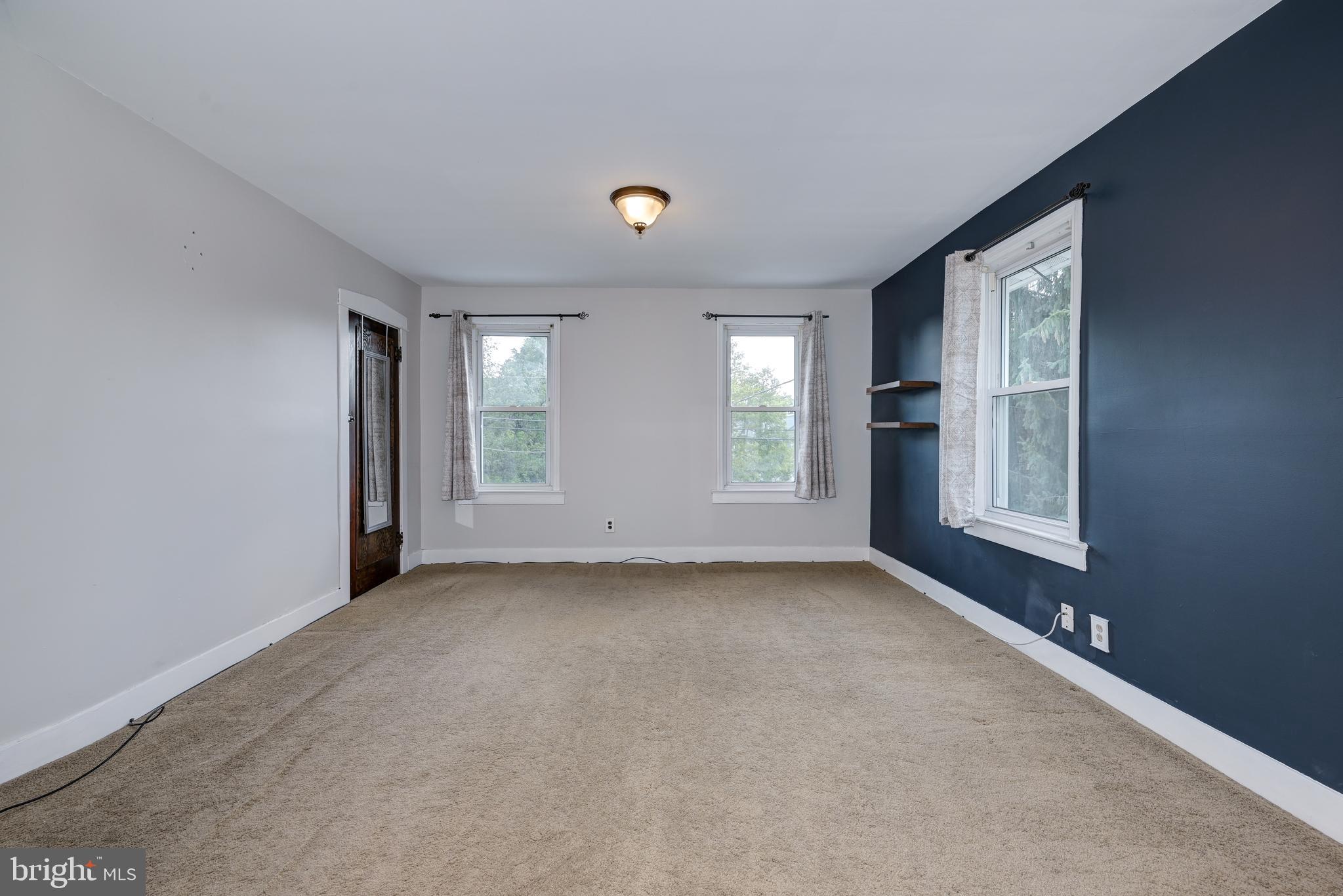 323 Cleveland Avenue Riverside, NJ 08075 - Photo 27 of 36 a view of an empty room with a window