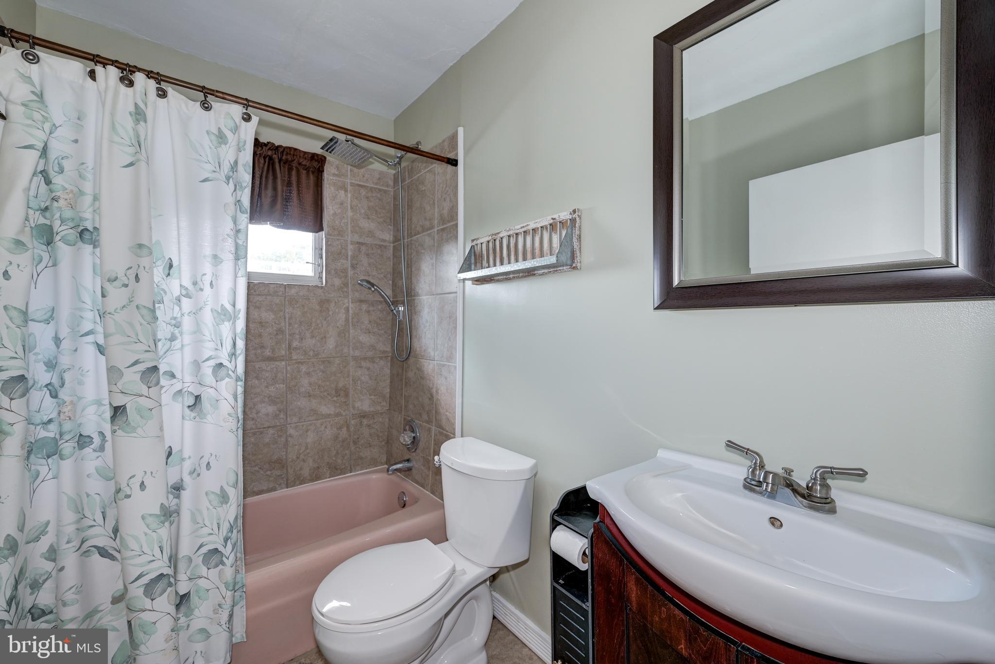 323 Cleveland Avenue Riverside, NJ 08075 - Photo 30 of 36 a bathroom with a sink toilet and shower