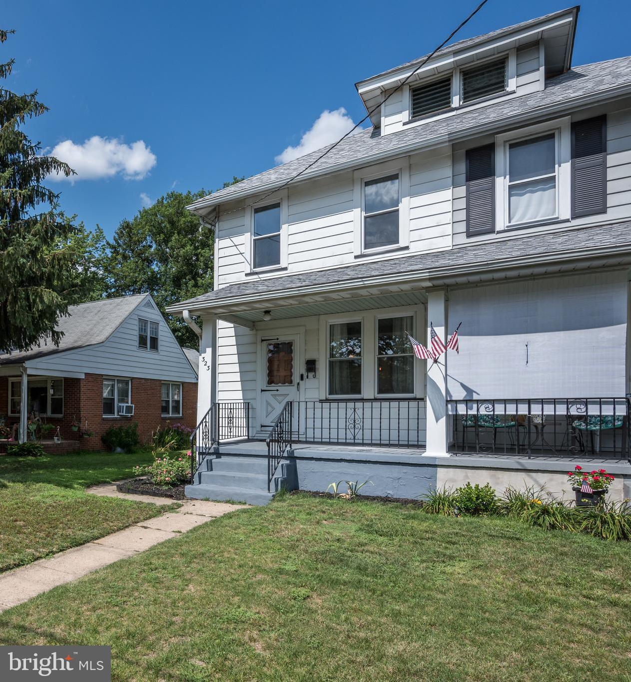 323 Cleveland Avenue Riverside, NJ 08075 - Photo 3 of 36 a front view of a house with a yard