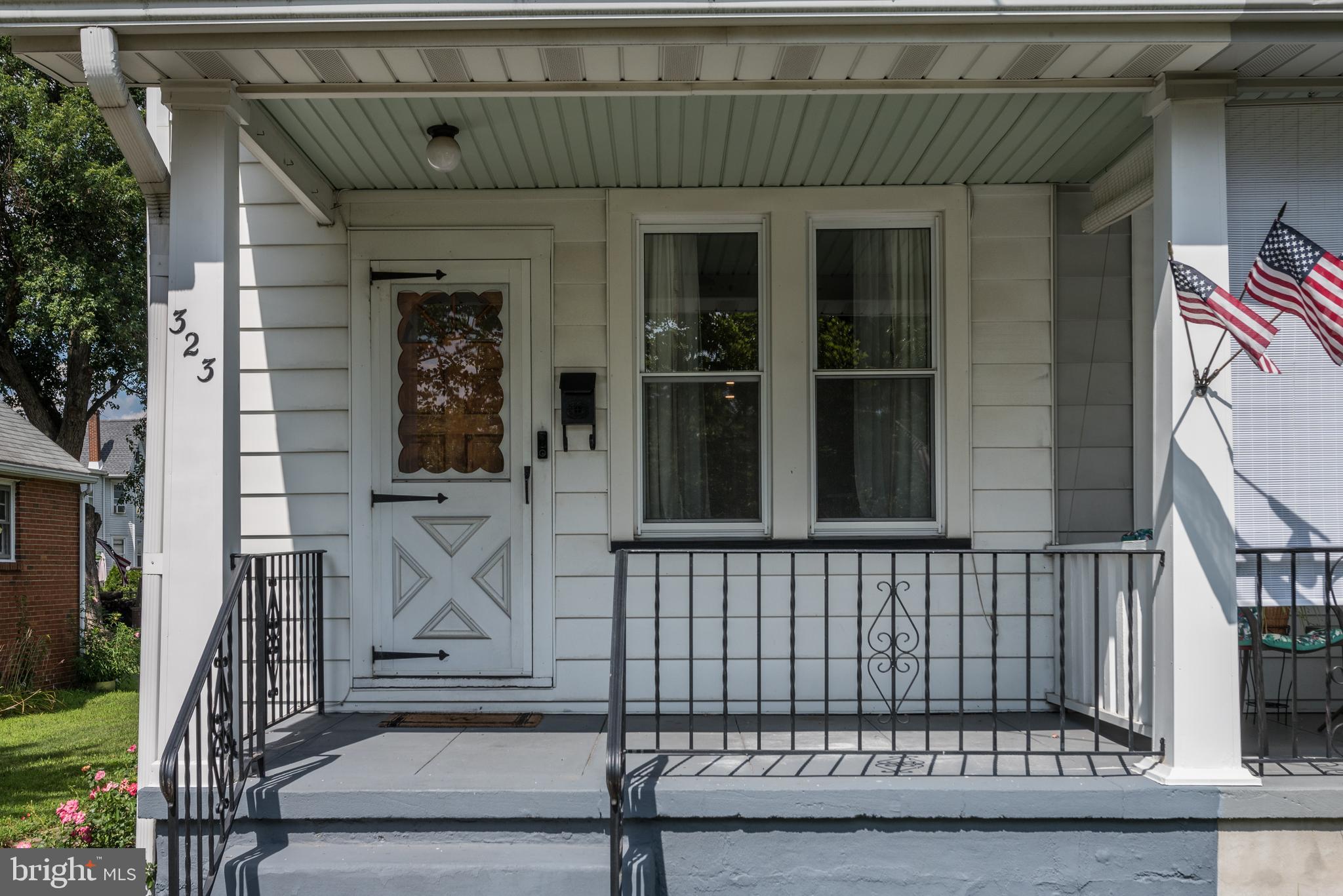 323 Cleveland Avenue Riverside, NJ 08075 - Photo 5 of 36 front view of a house with a glass door