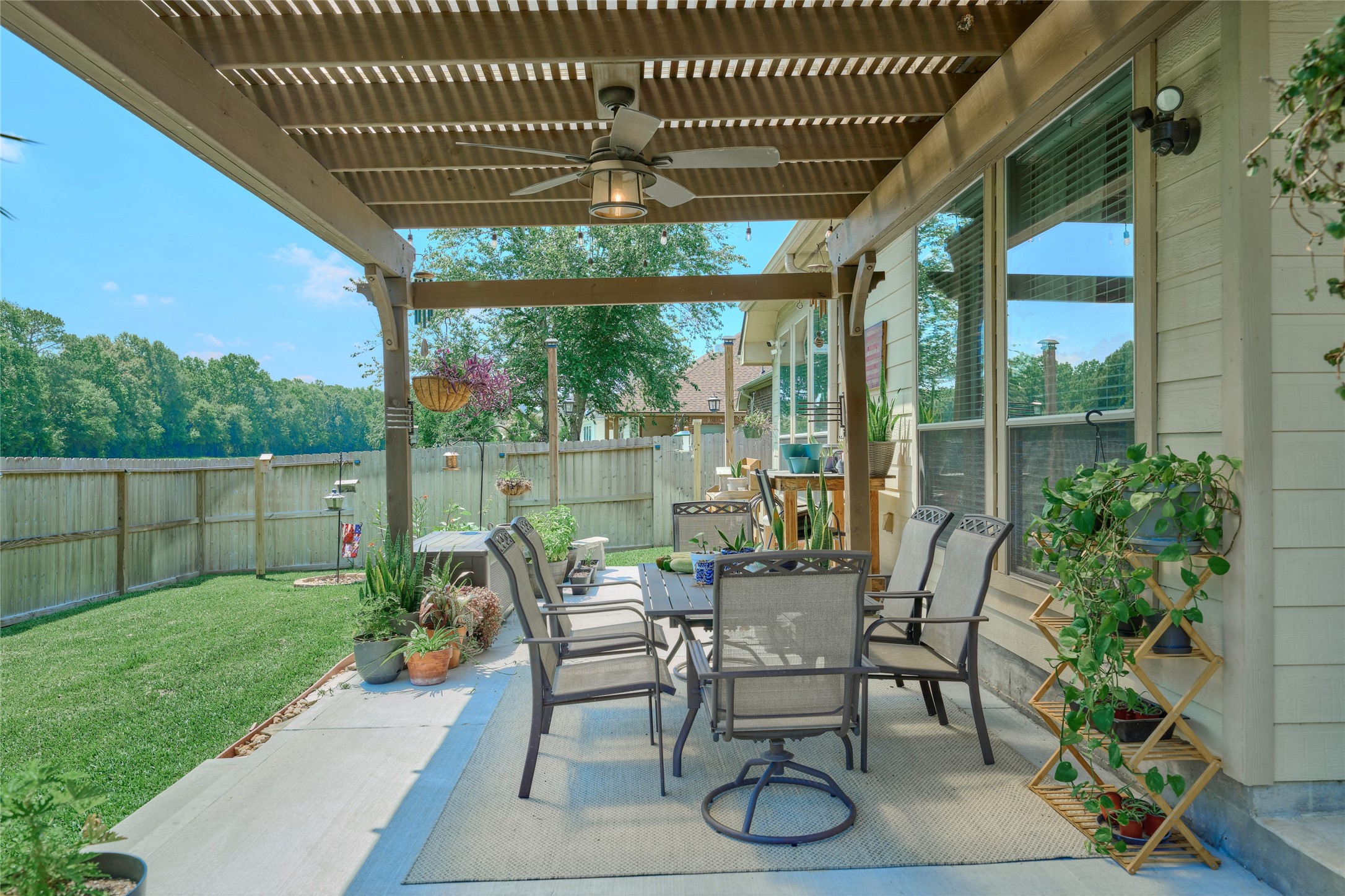 28322 Madelin Manor Lane Spring, TX 77386 - Photo 36 of 46 a view of a porch with furniture and garden