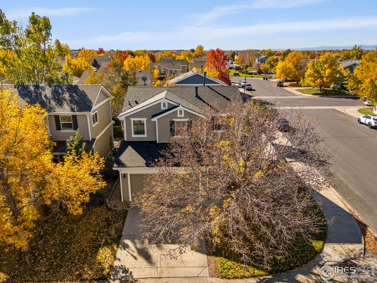 10688 Durango Place Longmont, CO 80504 - Photo 26 of 49 a view of a house with a yard