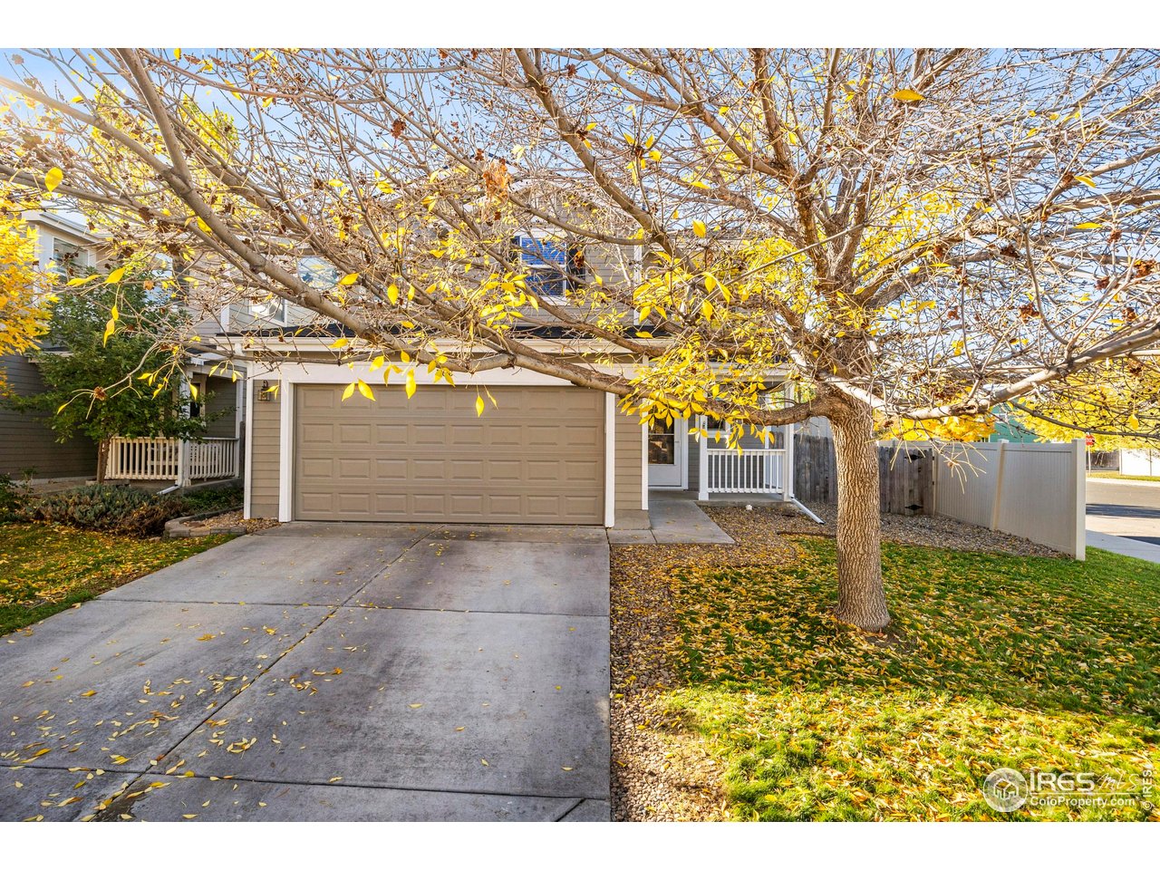 10688 Durango Place Longmont, CO 80504 - Photo 42 of 49 a front view of a house with a yard