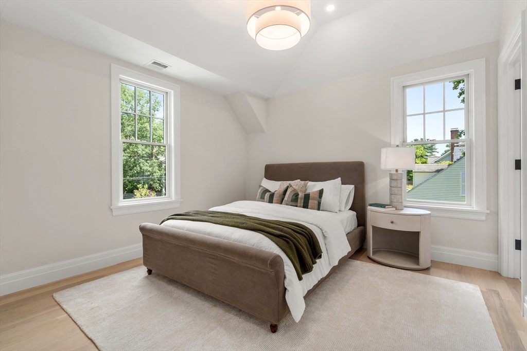 28 Parker Road Wellesley, MA 02482 - Photo 22 of 32 a bedroom with a bed and window