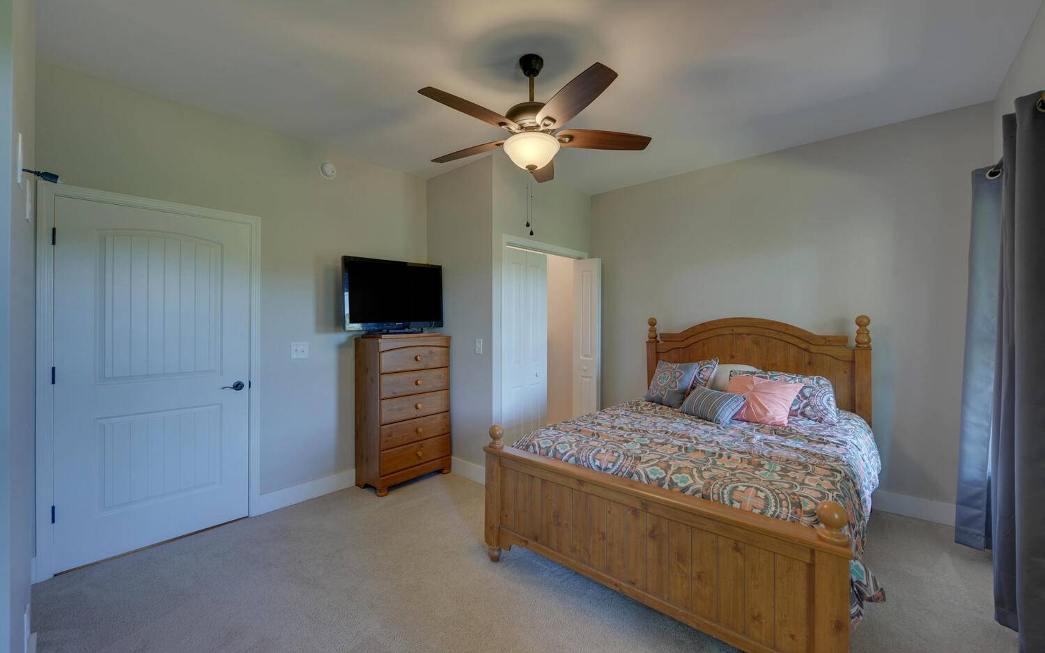 517 Wright Road Murphy, NC 28906 - Photo 20 of 44 a bedroom with a bed and a flat tv screen on dresser