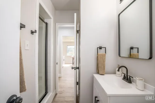 a bathroom with a sink and a mirror