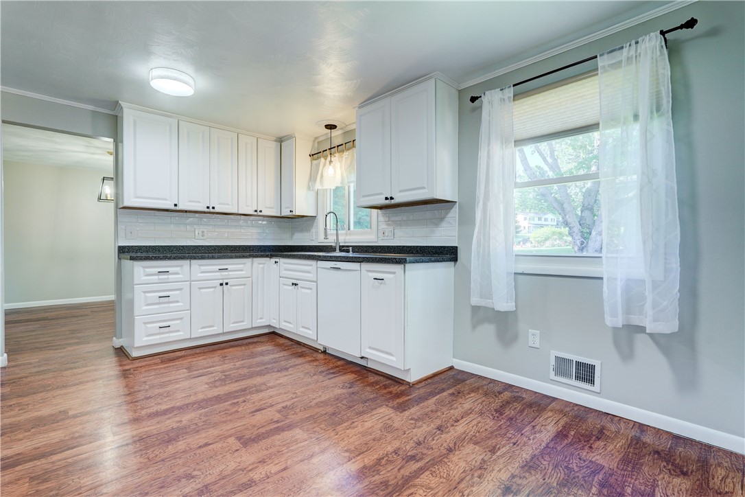 212 Hollybrook Road Sweden, NY 14420 - Photo 10 of 39 tKitchen- brand new tile backsplash!