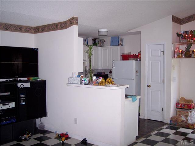 5519 Marthonna Way Raleigh, NC 27616 - Photo 6 of 10 a room with furniture and a flat screen tv