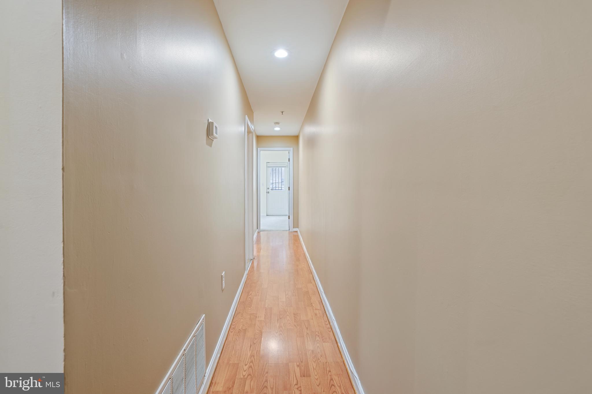 1117 O Street Northwest, Unit 2 Washington, DC 20005 - Photo 9 of 26 Hallway toward two bedrooms