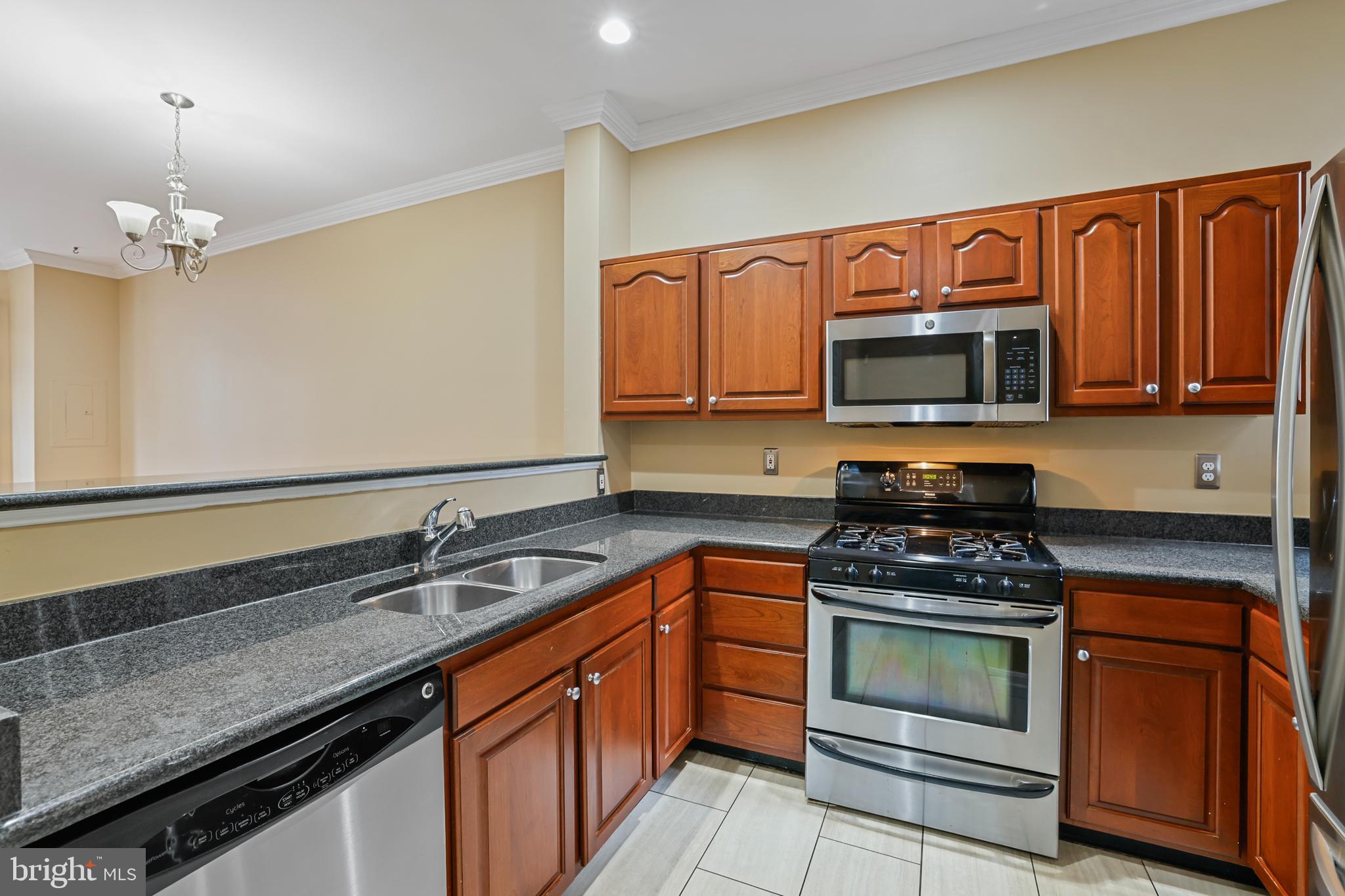 1117 O Street Northwest, Unit 2 Washington, DC 20005 - Photo 6 of 26 Kitchen and view to living area