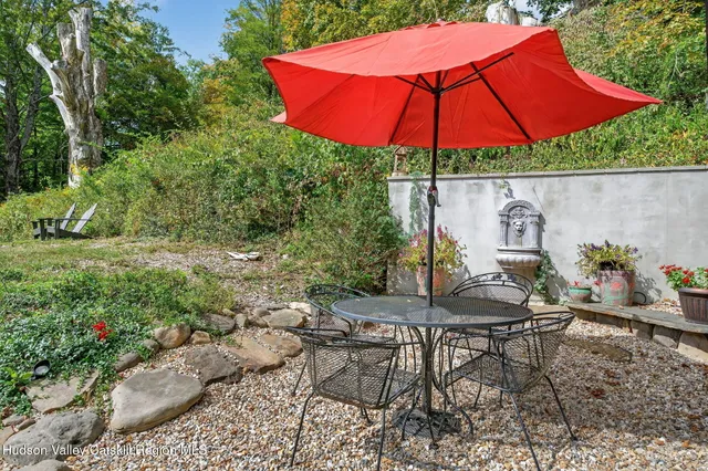 a view of a building with a yard