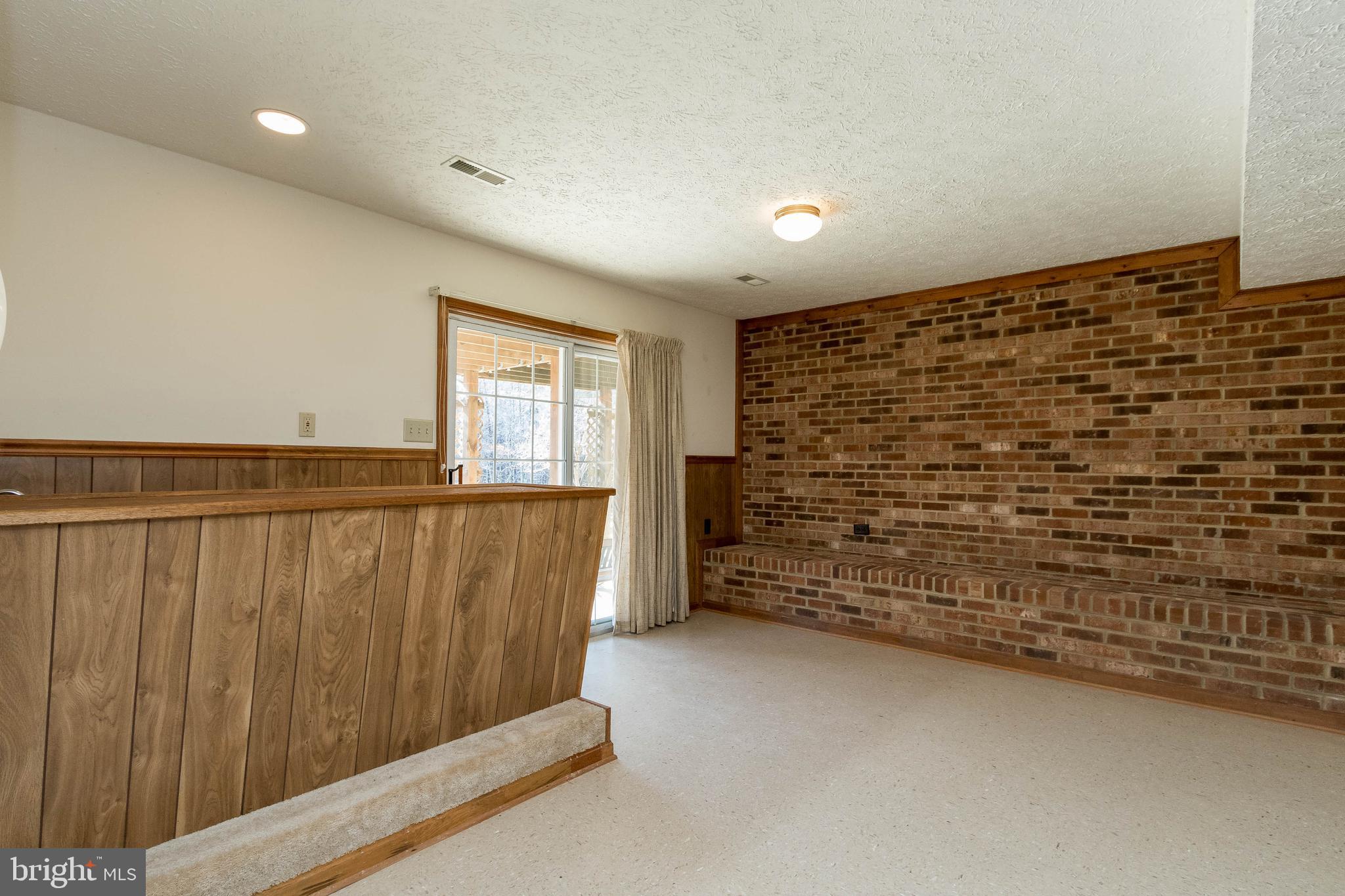 39 Salem Lane Stafford, VA 22554 - Photo 27 of 34 Bar with sink in basement
