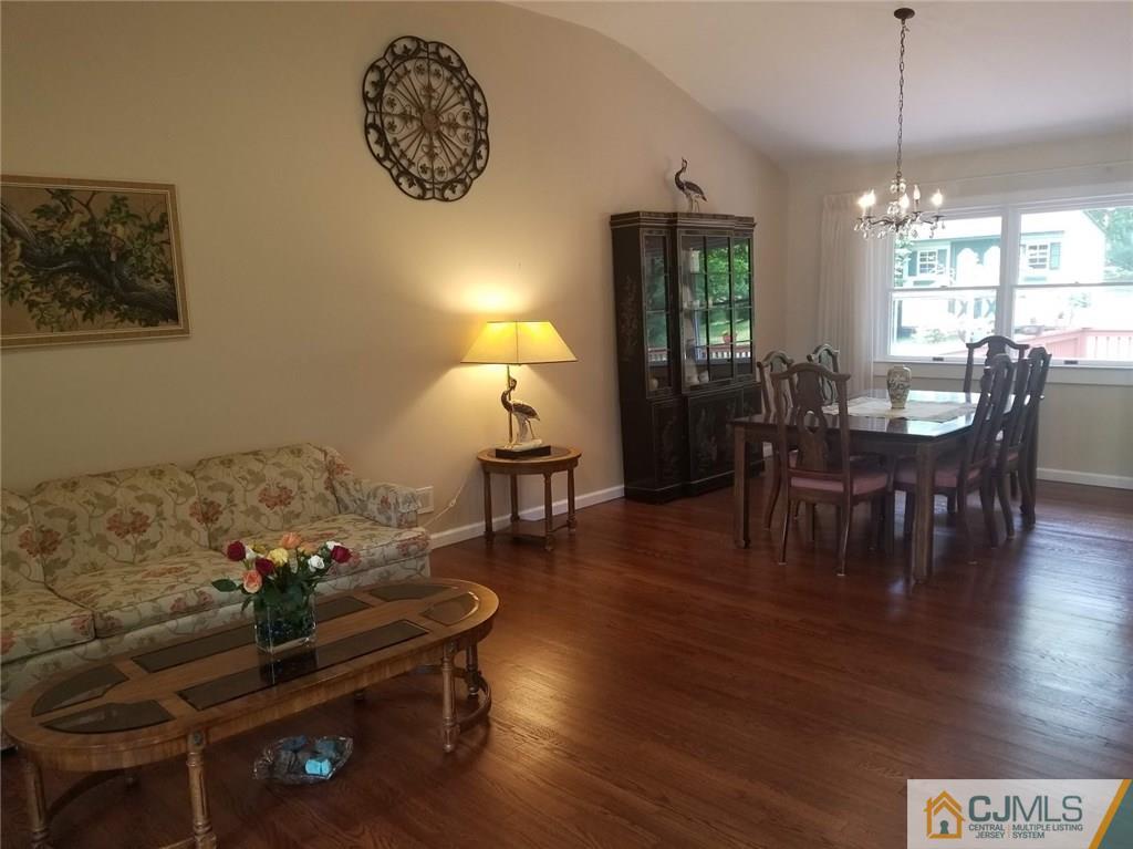 30 Agate Road East Brunswick, NJ 08816 - Photo 14 of 40 a living room with furniture and a table