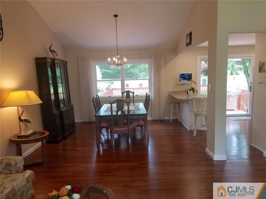 30 Agate Road East Brunswick, NJ 08816 - Photo 15 of 40 a view of a dining room with furniture window and wooden floor