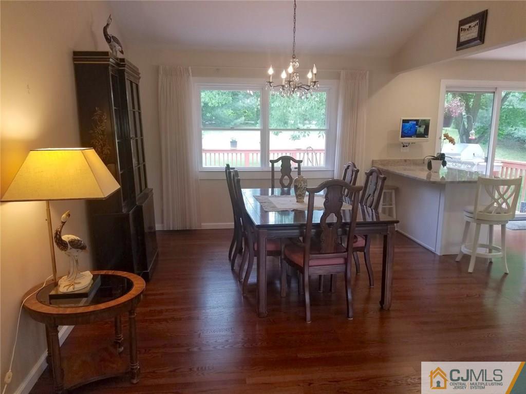 30 Agate Road East Brunswick, NJ 08816 - Photo 16 of 40 a view of a dining room with furniture window and outside view