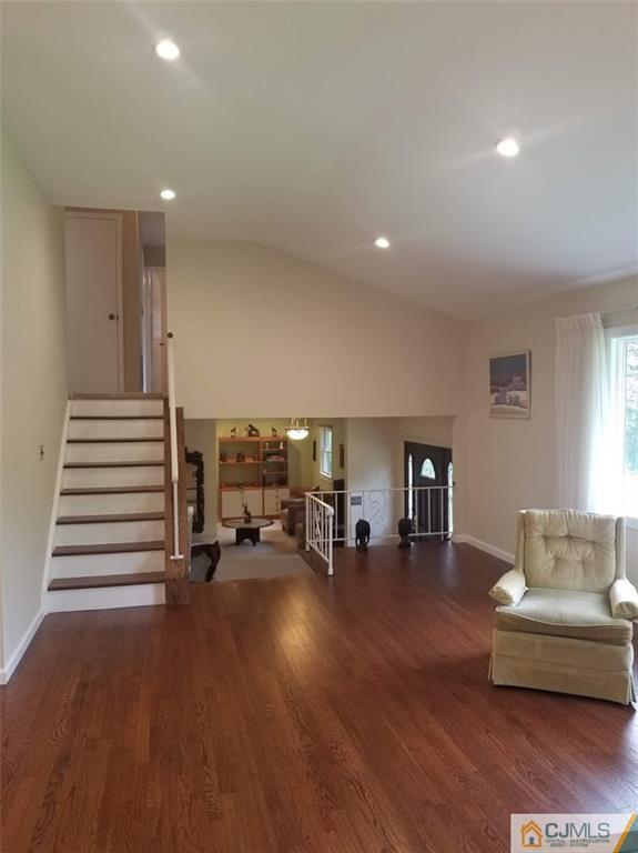 30 Agate Road East Brunswick, NJ 08816 - Photo 22 of 40 a living room with furniture and a wooden floor