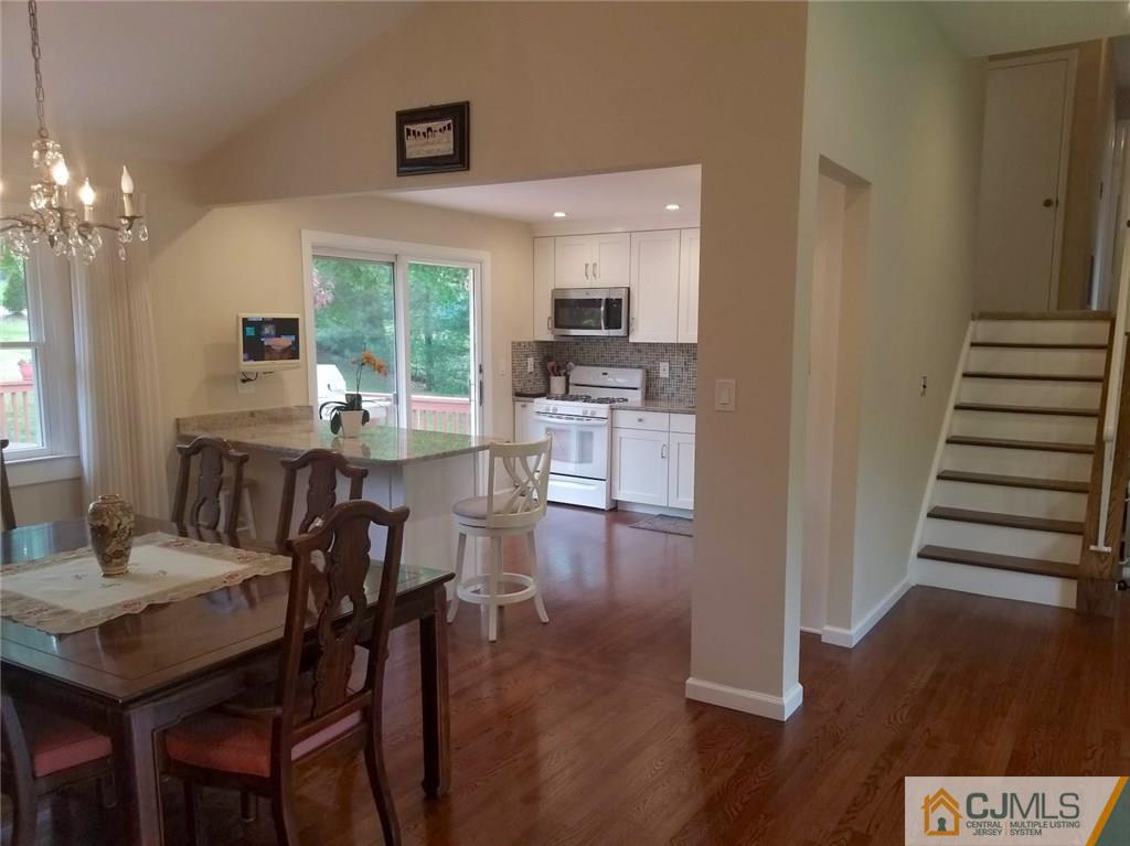 30 Agate Road East Brunswick, NJ 08816 - Photo 23 of 40 a view of a dining room with furniture window and wooden floor