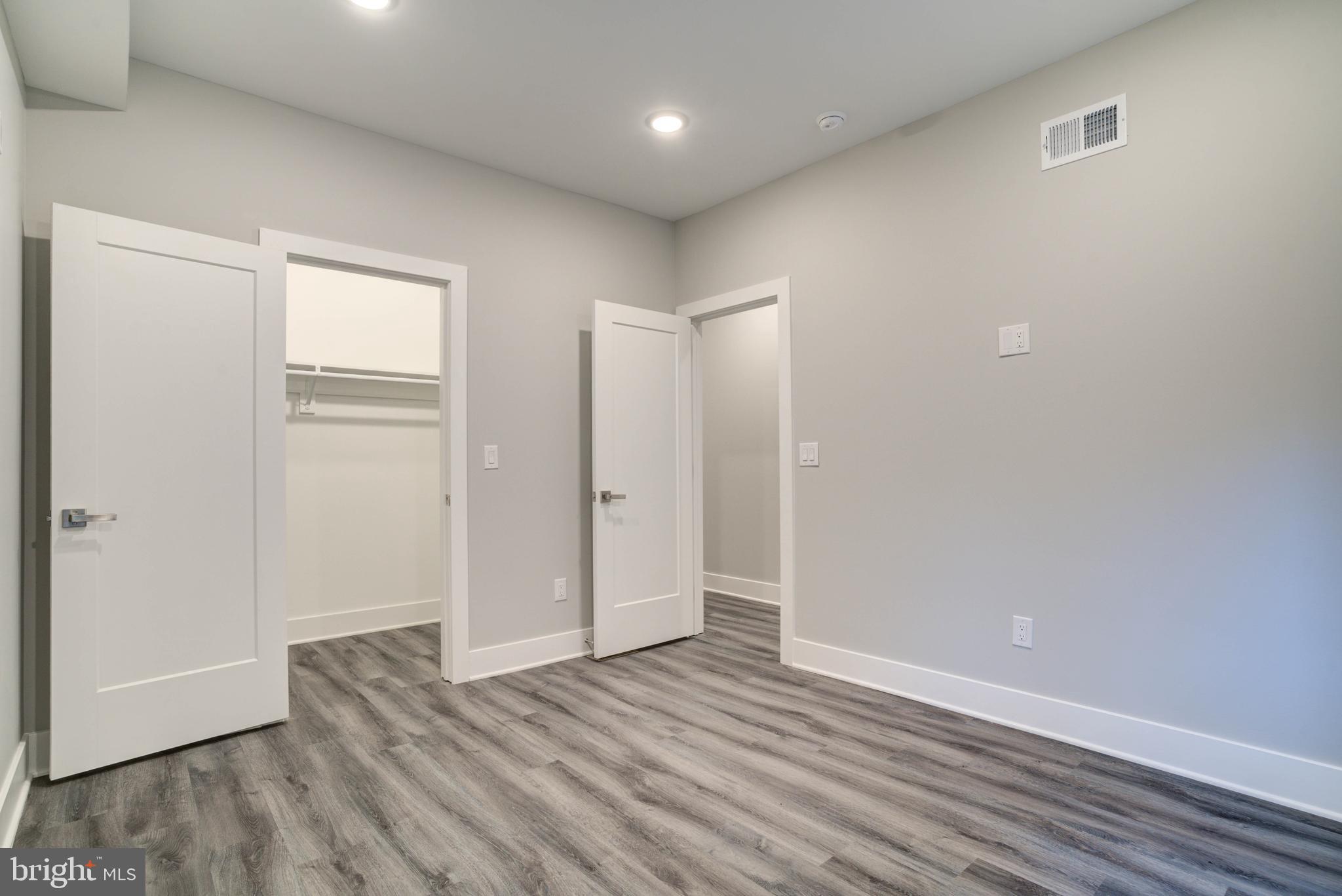5005 Walnut Street Philadelphia, PA 19139 - Photo 12 of 39 a view of an empty room with wooden floor