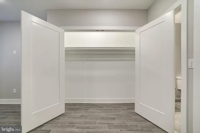 a view of an empty walk in closet