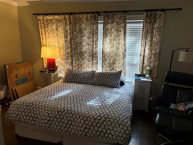 a bathroom with a toilet and shower