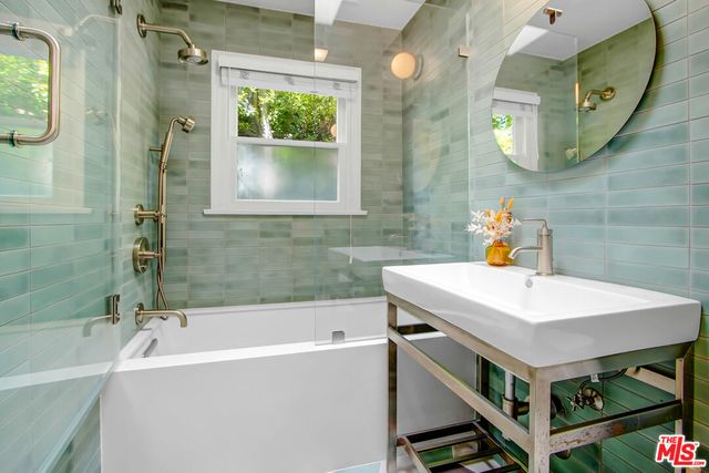 a bathroom with a sink and a bathtub