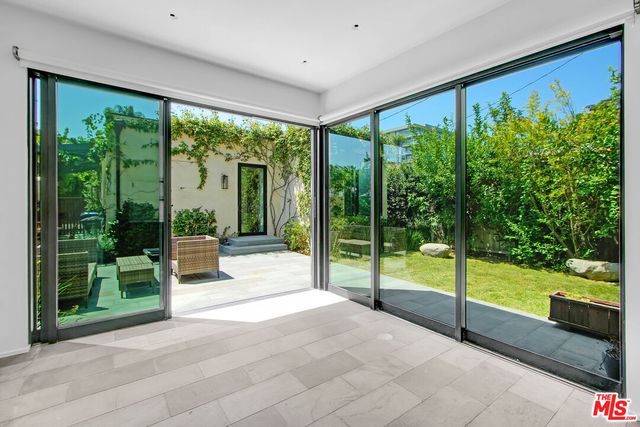 a view of porch with a yard