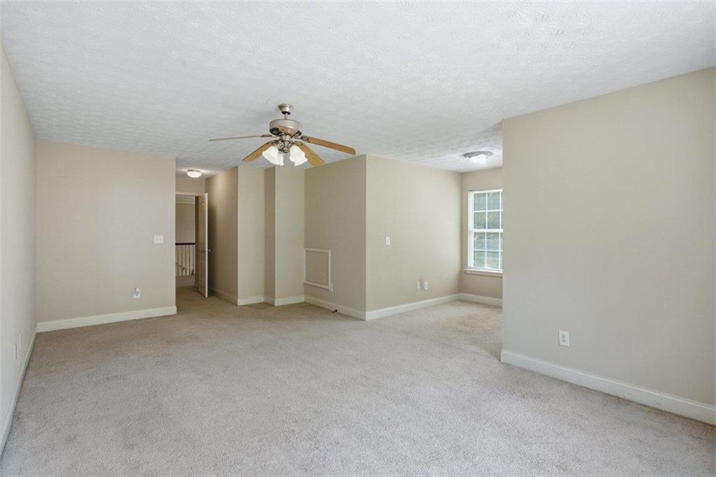 1231 Hillview Road Hampton, GA 30228 - Photo 30 of 49 an empty room with a bathroom and a mirror