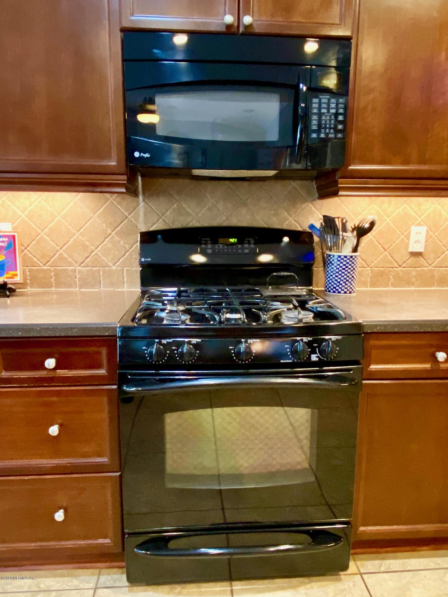 750 Porta Rosa Circle St. Augustine, FL 32092 - Photo 20 of 72 19. Stove and Microwave