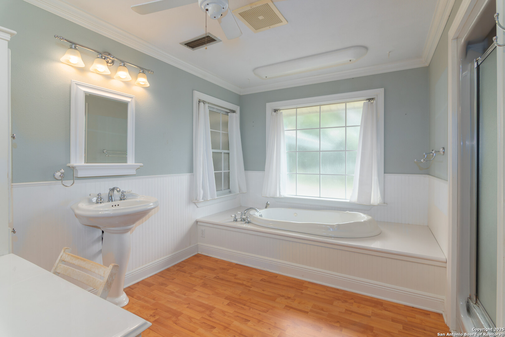2981 Vivroux Ranch Road Seguin, TX 78155 - Photo 24 of 50 a bathroom with a sink and a bathtub