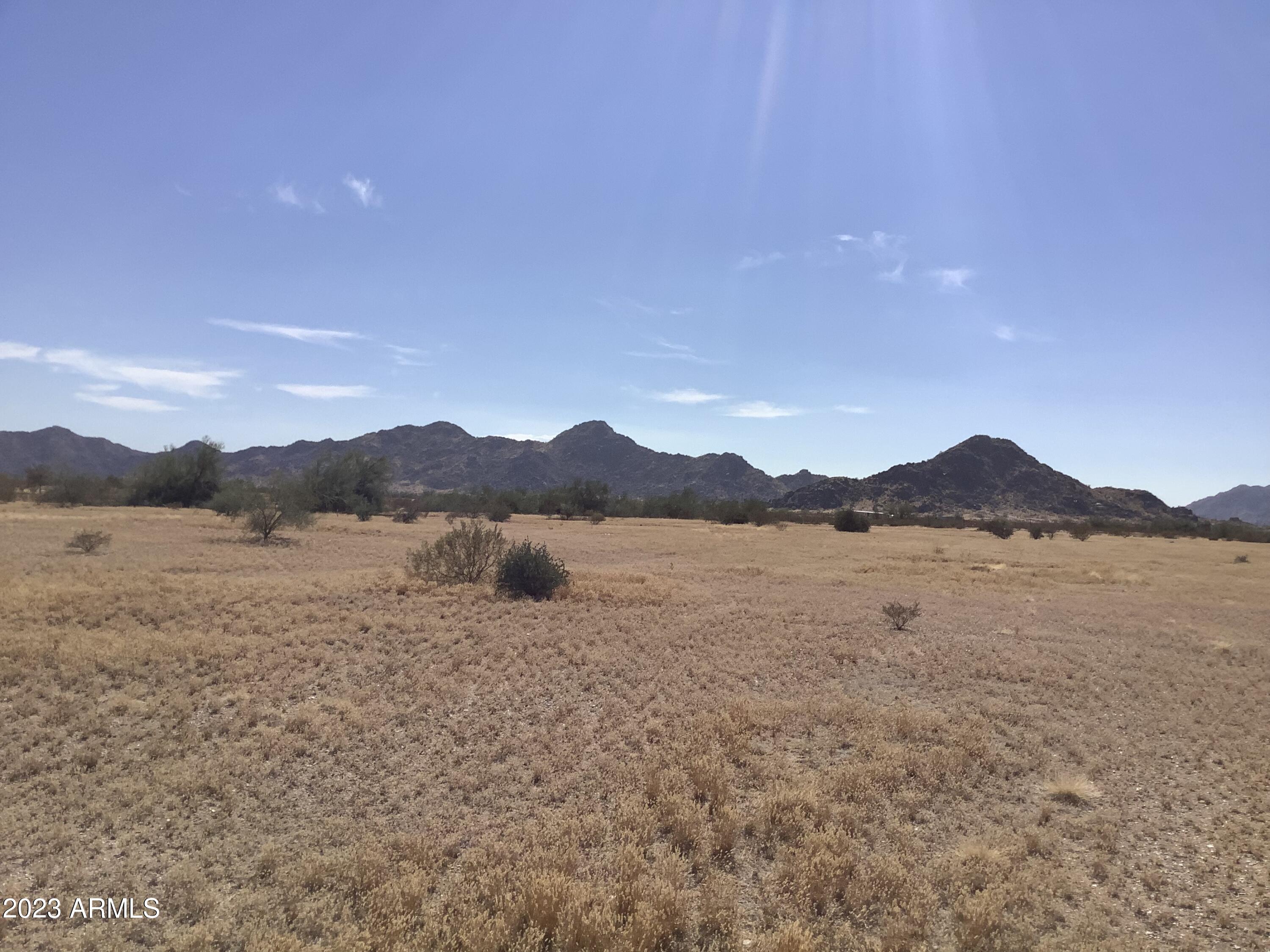 3 Horizon Ranch, Unit 3 Buckeye, AZ 85326 - Photo 7 of 12 a view of lake with mountain
