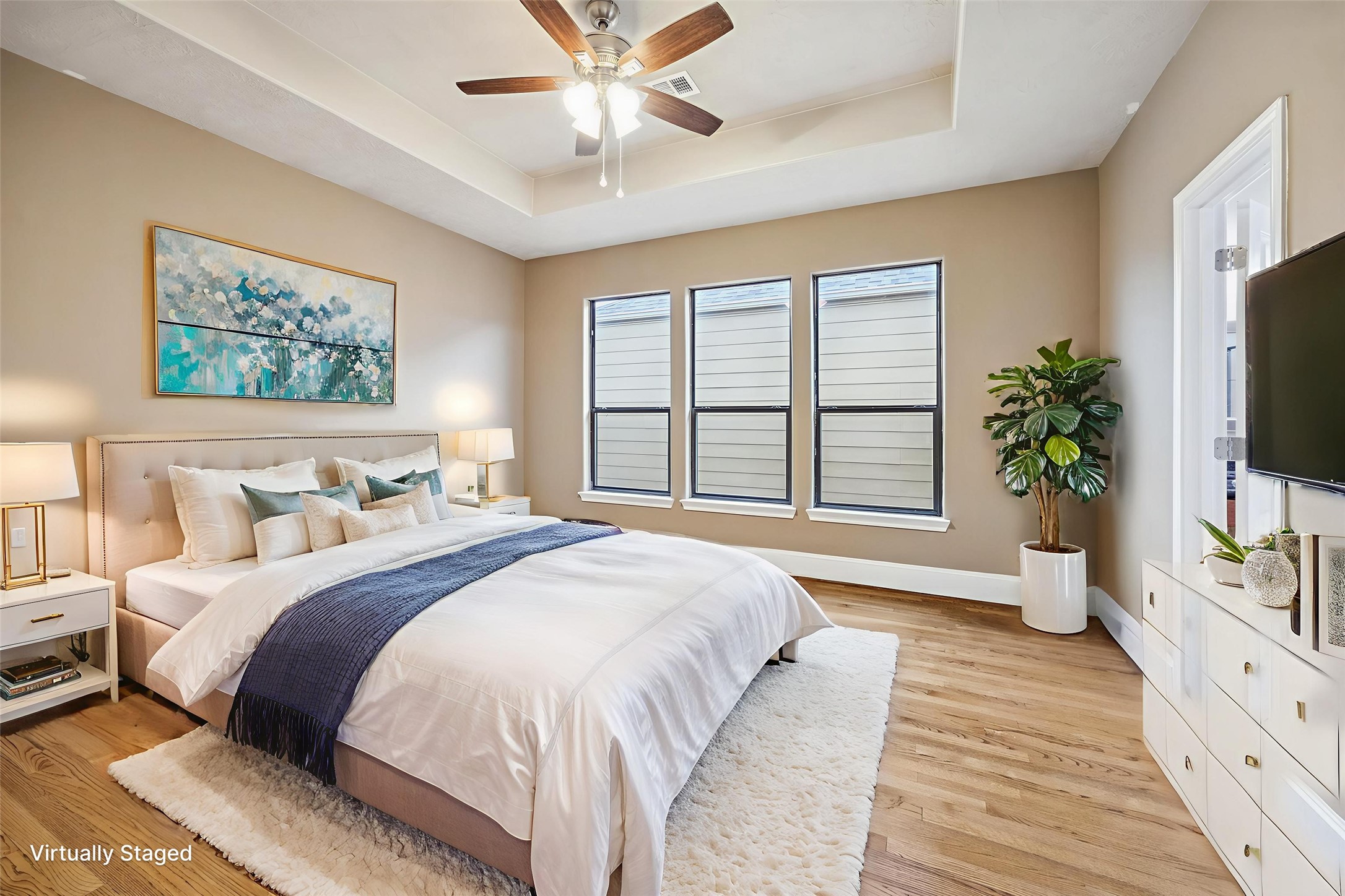 1376 Studer Street Houston, TX 77007 - Photo 14 of 38 a spacious bedroom with a large bed and a large window