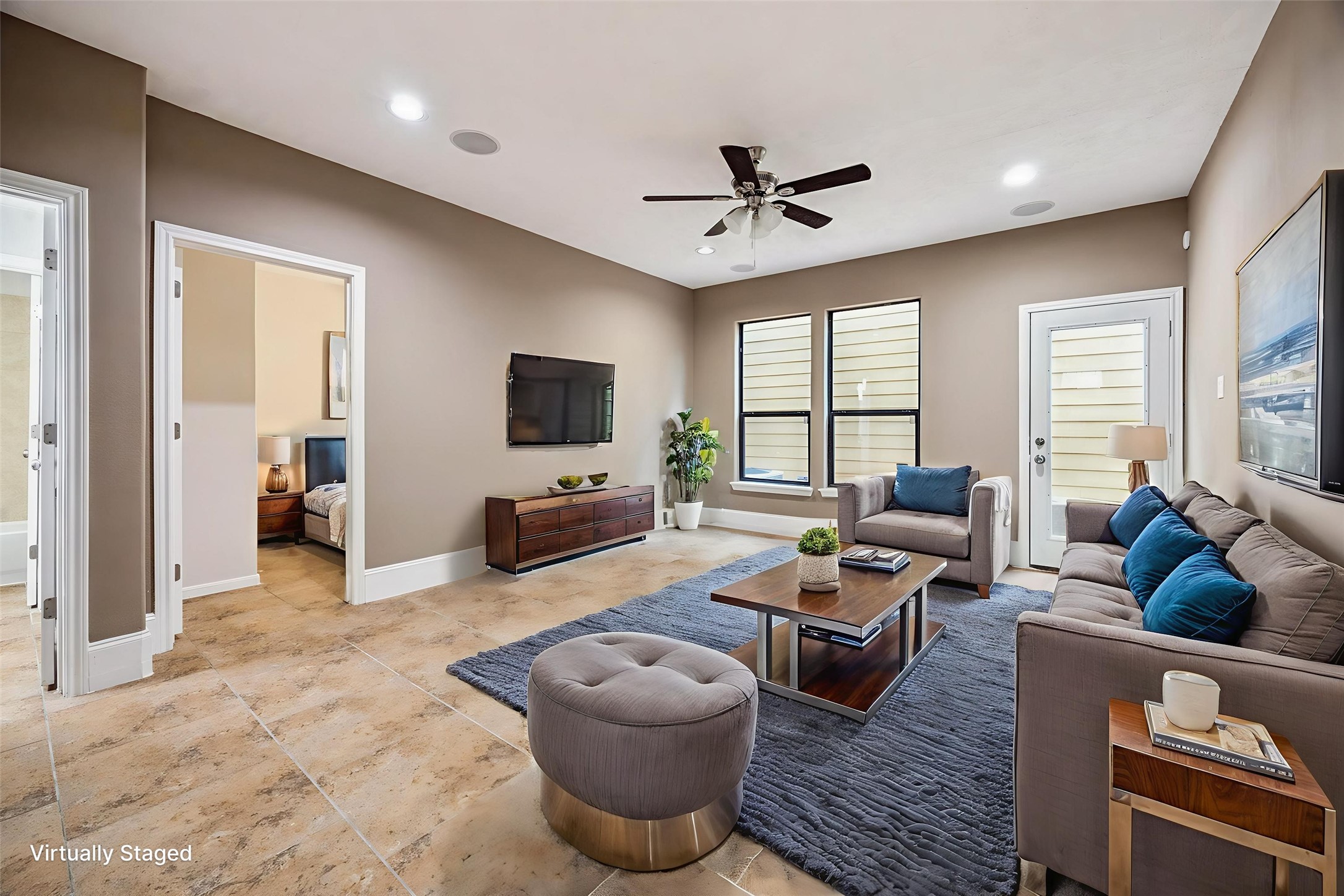 1376 Studer Street Houston, TX 77007 - Photo 20 of 38 a living room with furniture or couch and a flat screen tv