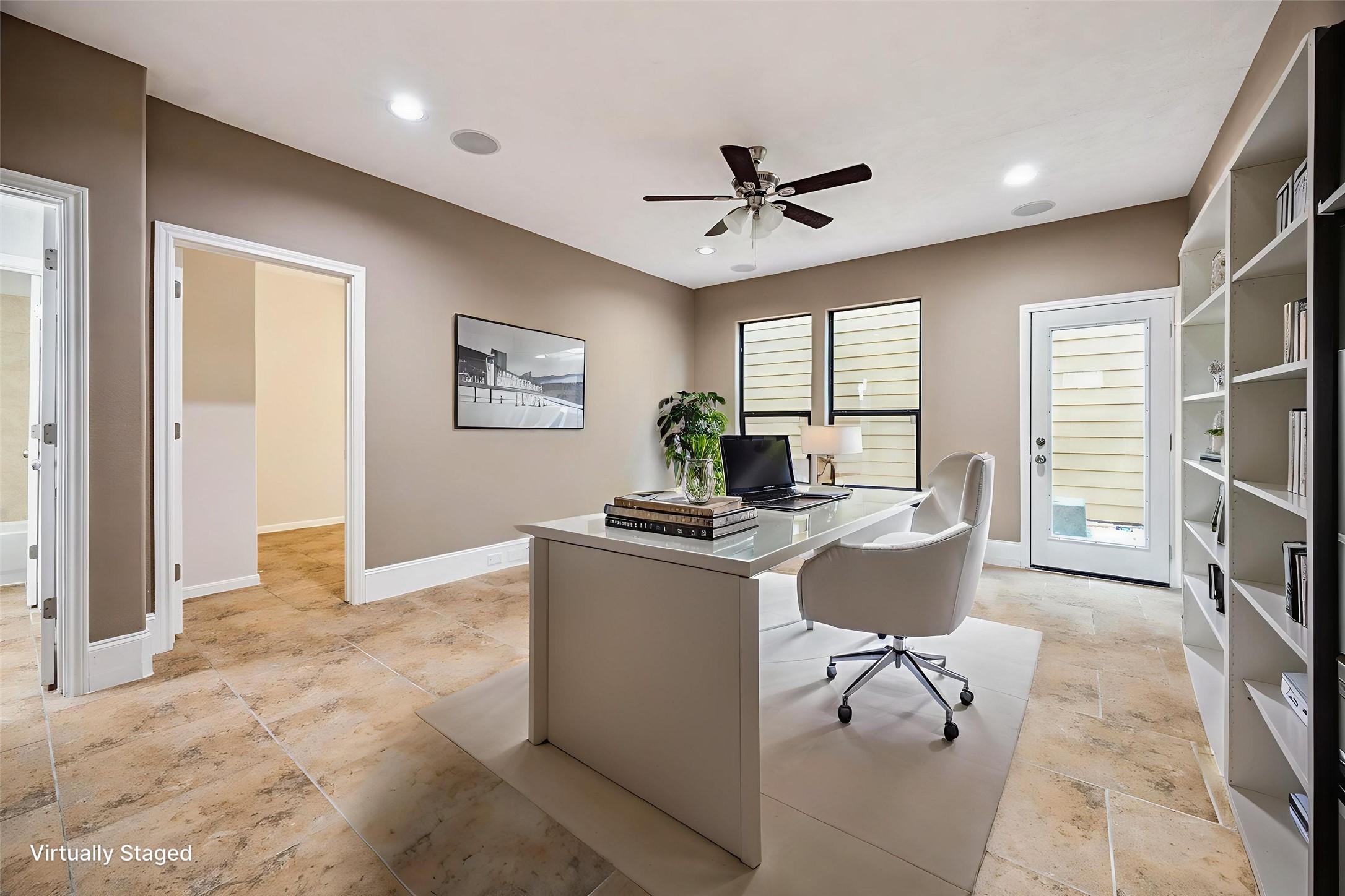 1376 Studer Street Houston, TX 77007 - Photo 21 of 38 a view of a livingroom with workspace and a window