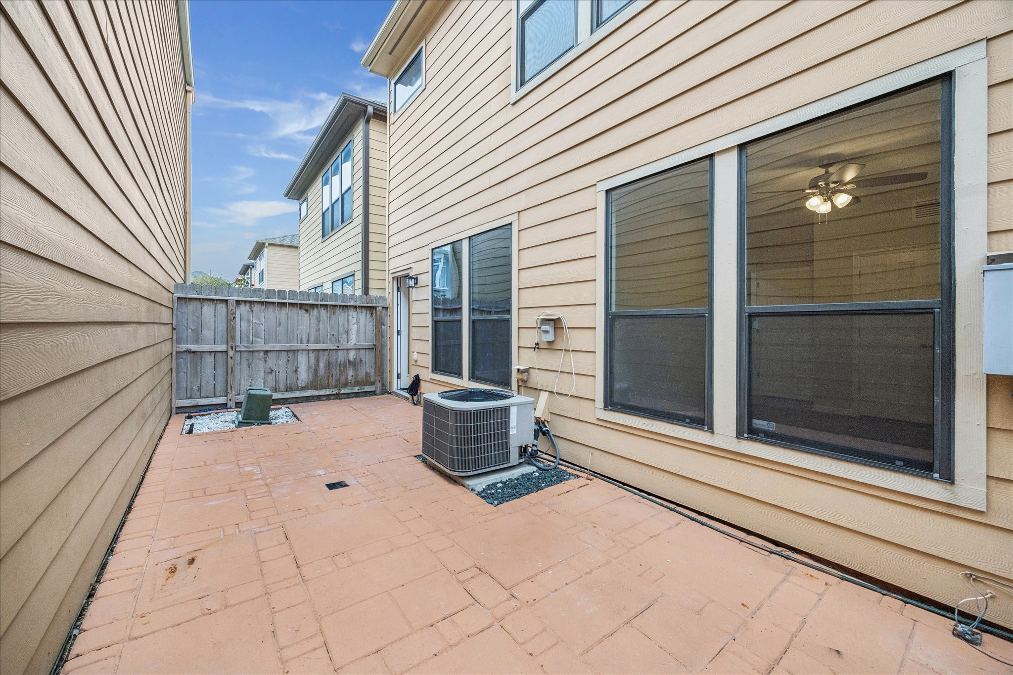 1376 Studer Street Houston, TX 77007 - Photo 32 of 38 a backyard of a house with outdoor seating