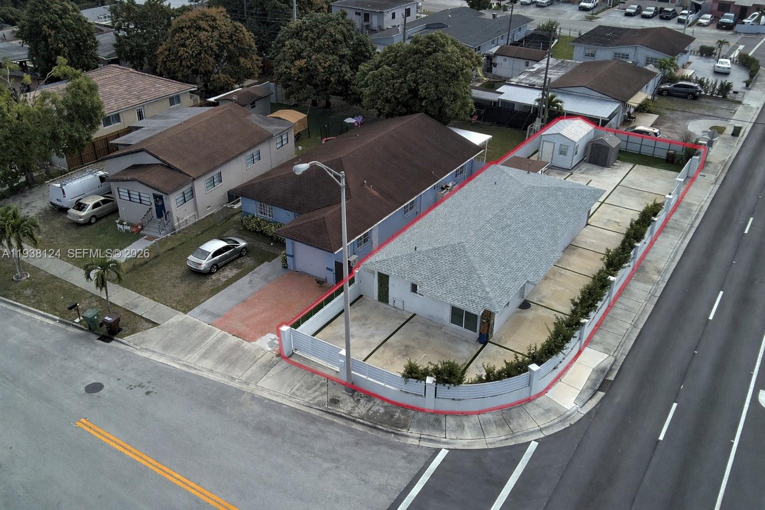 798 West 31st Street Hialeah, FL 33012 - Photo 15 of 15 an aerial view of a house with a swimming pool