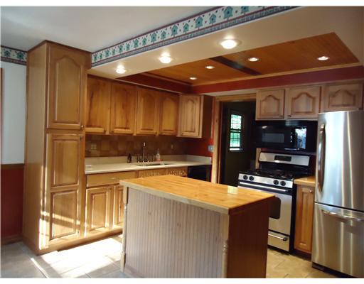 1314 Chicora Road Chicora, PA 16025 - Photo 2 of 18 Exterior Front. Beautiful hickory kitchen with island, porclain tile, recess lighting.