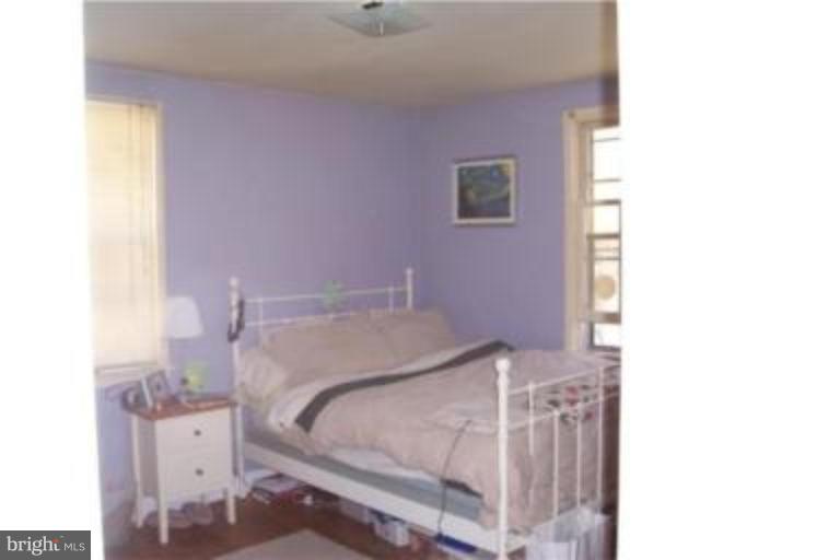 612 Anneslie Road Baltimore, MD 21212 - Photo 3 of 19 a bedroom with a bed and a mirror