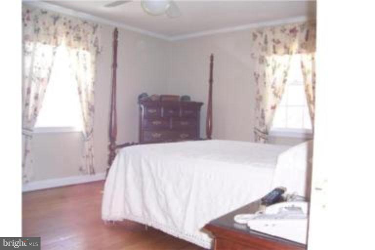 612 Anneslie Road Baltimore, MD 21212 - Photo 5 of 19 a bedroom with a bed and a window