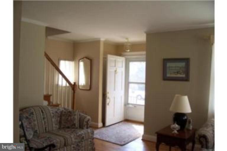 612 Anneslie Road Baltimore, MD 21212 - Photo 6 of 19 a living room with furniture and wooden floor