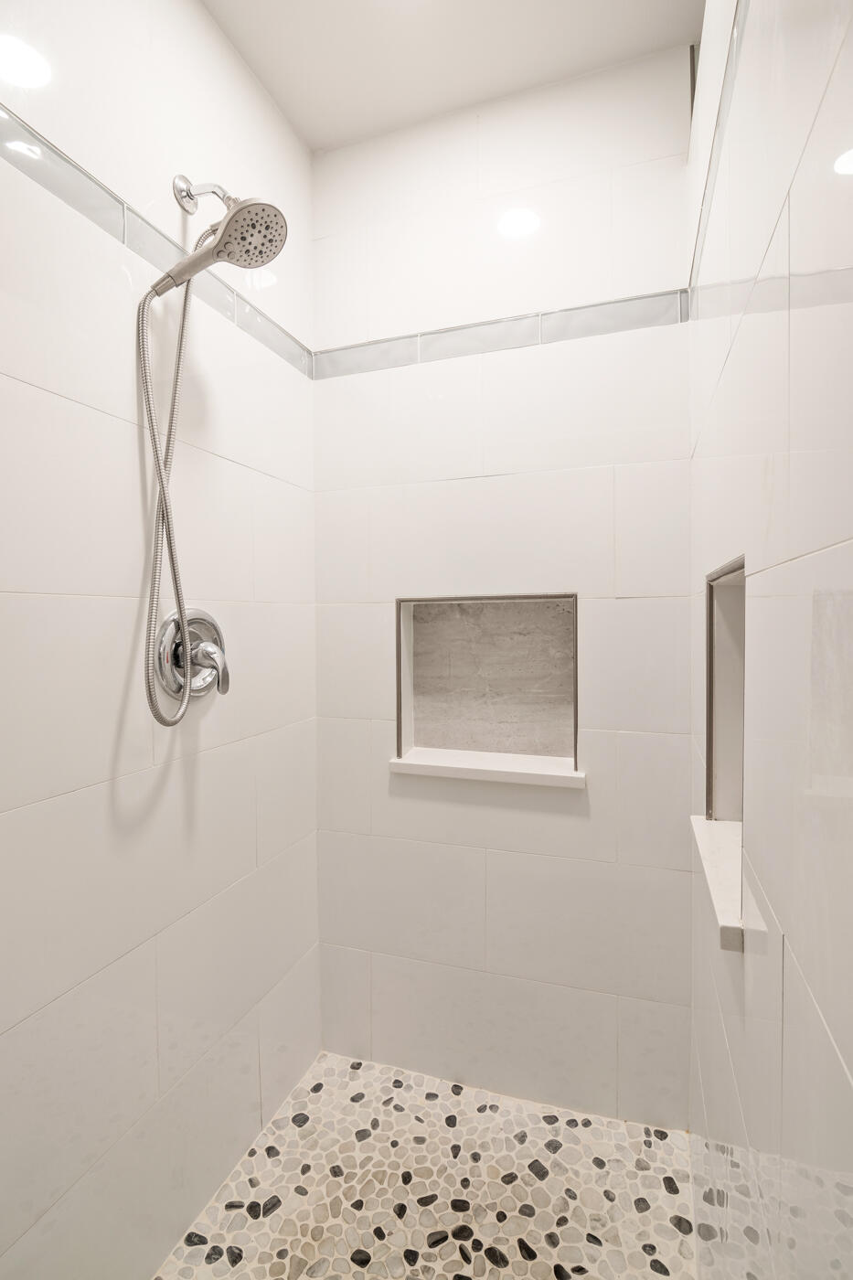 849 Gardener Road Rockledge, FL 32955 - Photo 13 of 31 a bathroom with a window and a walk in closet